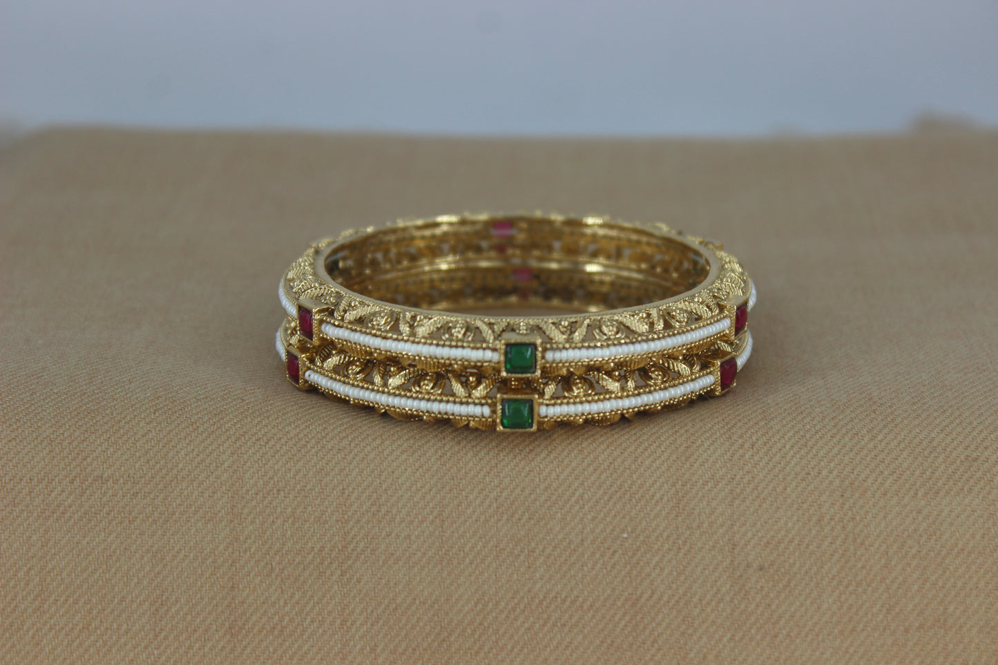 Evergreen thin Pearl Bangles with colored stone work (Design 38)