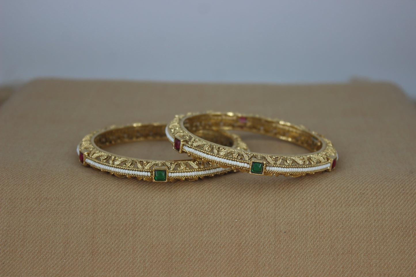 Evergreen thin Pearl Bangles with colored stone work (Design 38)