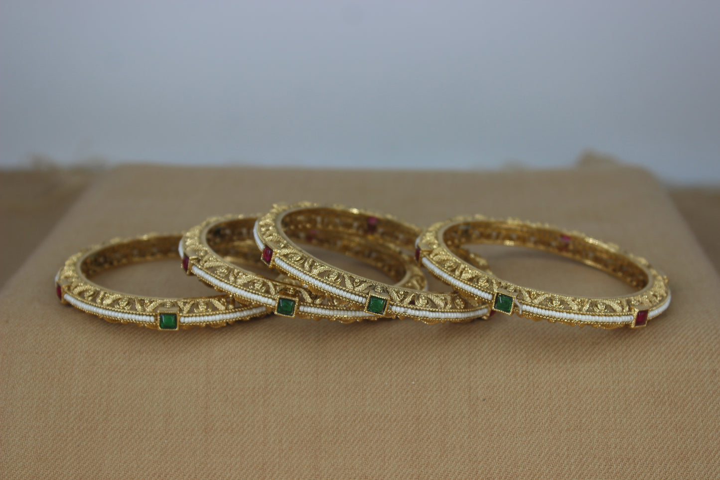 Evergreen thin Pearl Bangles with colored stone work (Design 38)