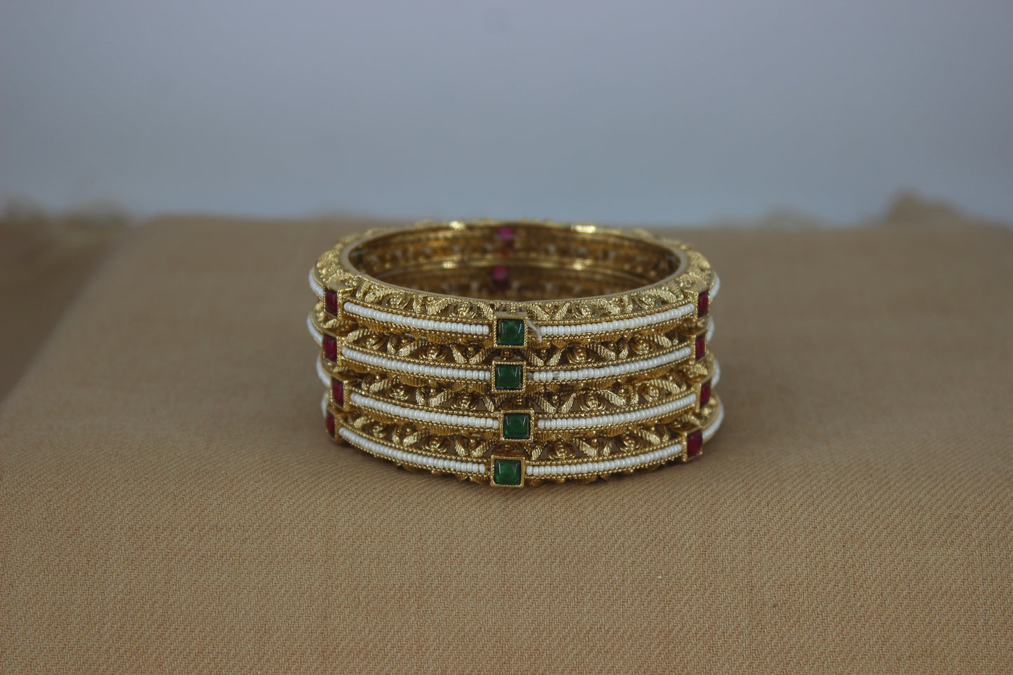 Evergreen thin Pearl Bangles with colored stone work (Design 38)